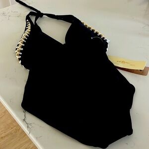 Gorgeous swimsuit with netting around top and low back!The details!